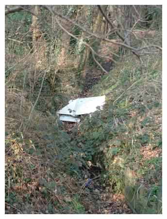 Rubbish - radiators in ditch